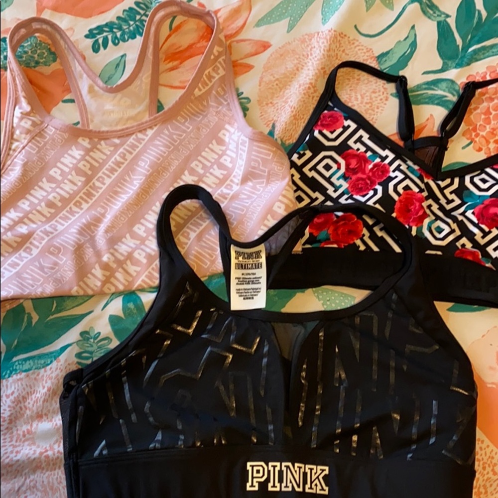 SOLD 3 Pink sports bras, all size med.